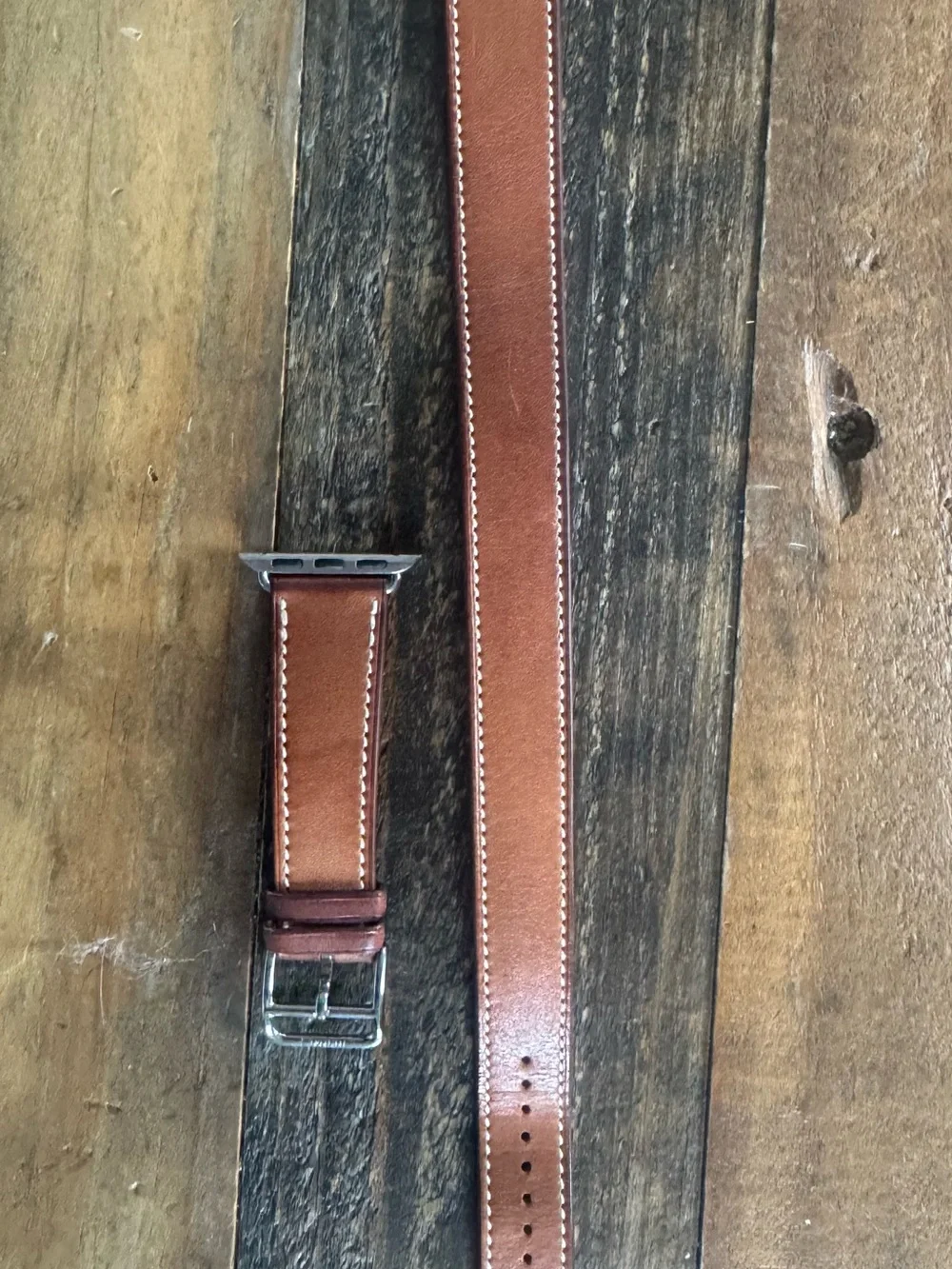 Hermes Apple Watch with orange and double tour leather bands